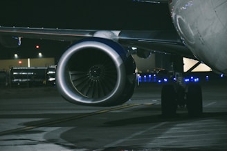A large jetliner sitting on top of an airport tarmac