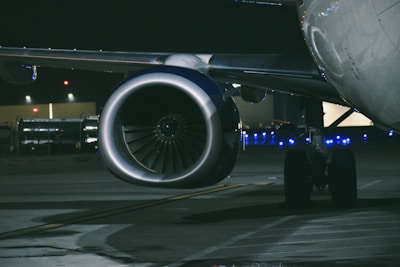 A large jetliner sitting on top of an airport tarmac