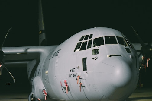 A large jetliner sitting on top of an airport tarmac