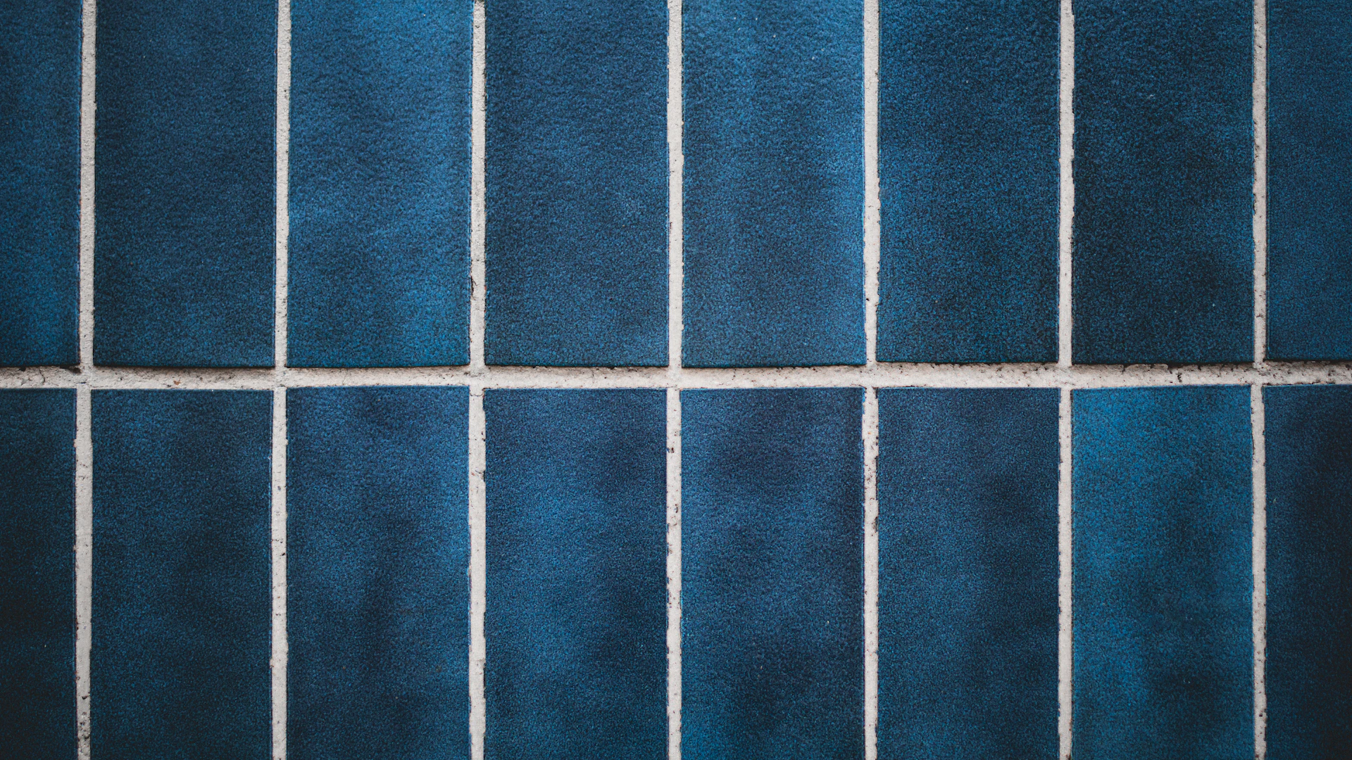 A close up of a jail cell with bars
