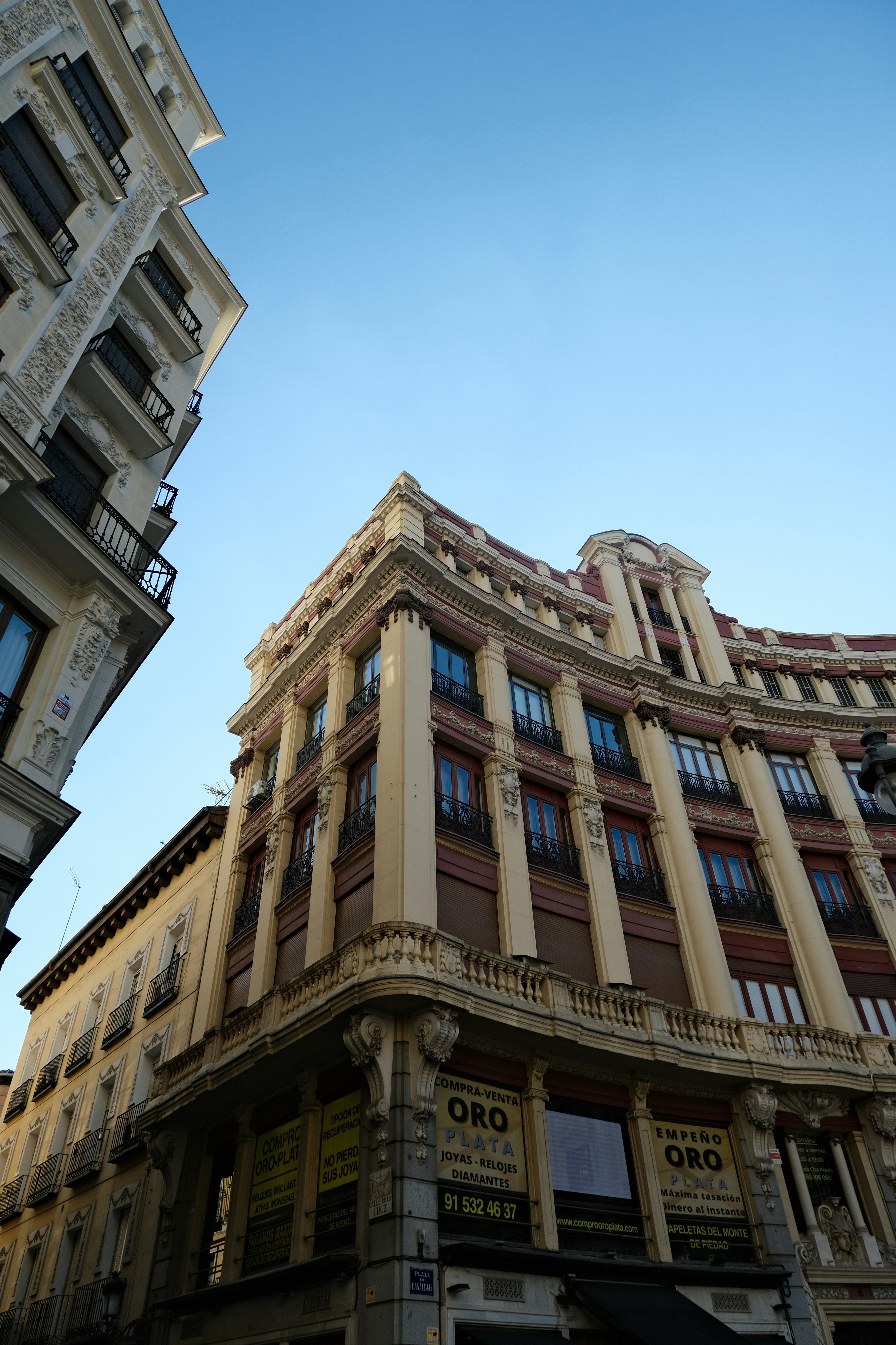 A tall building sitting next to a tall building
