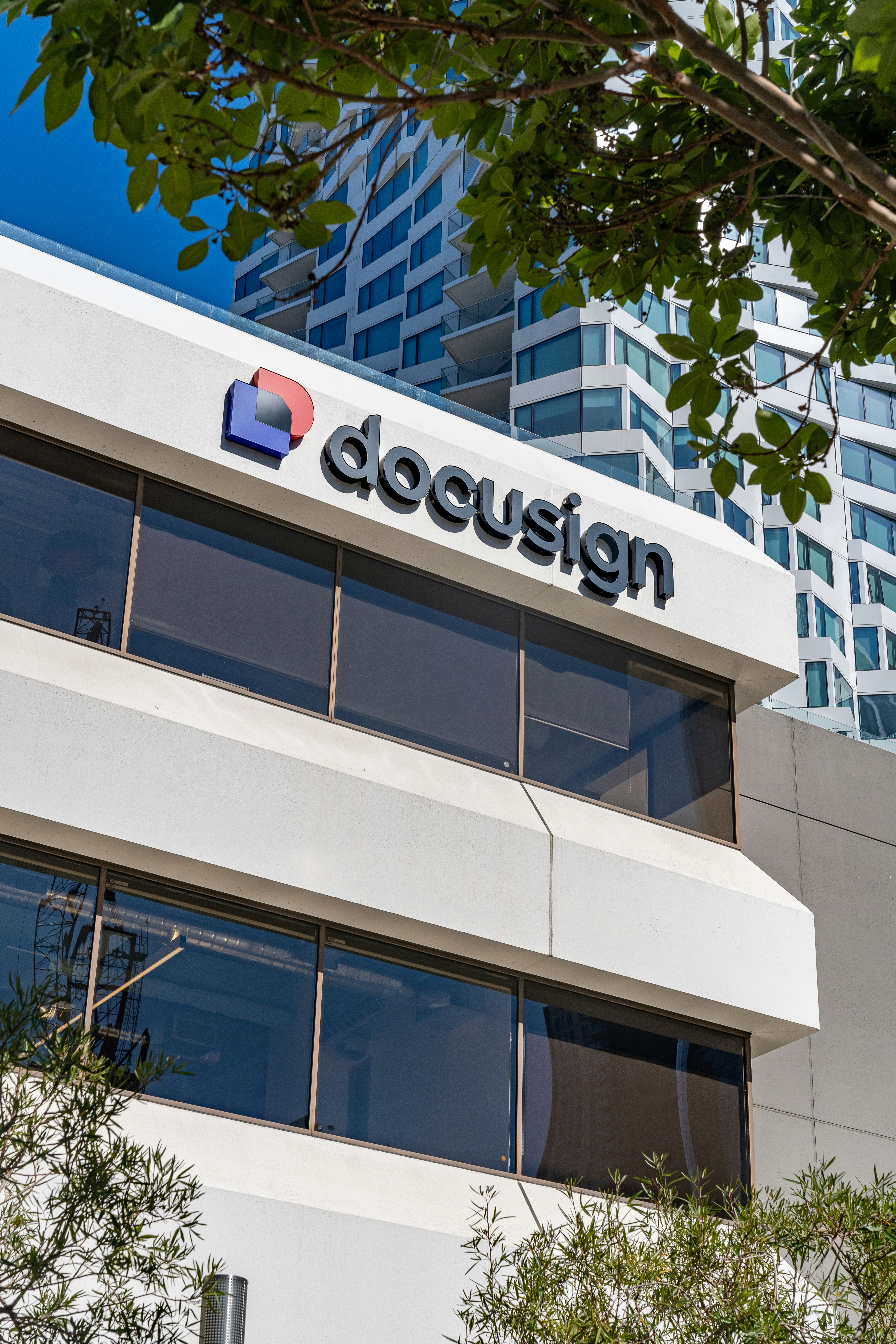 The outside of a building with a sign on it