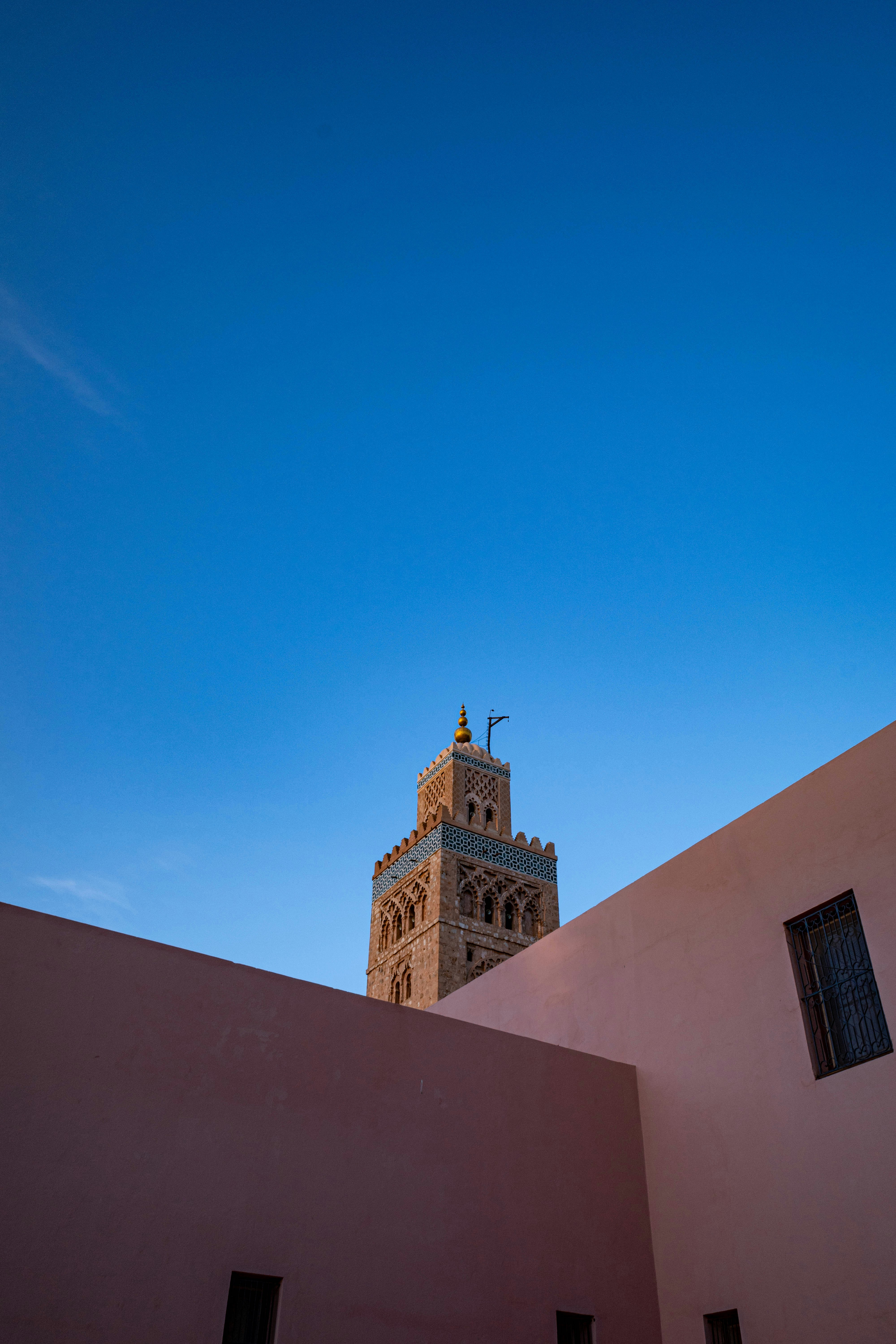 A tall clock tower towering over a city