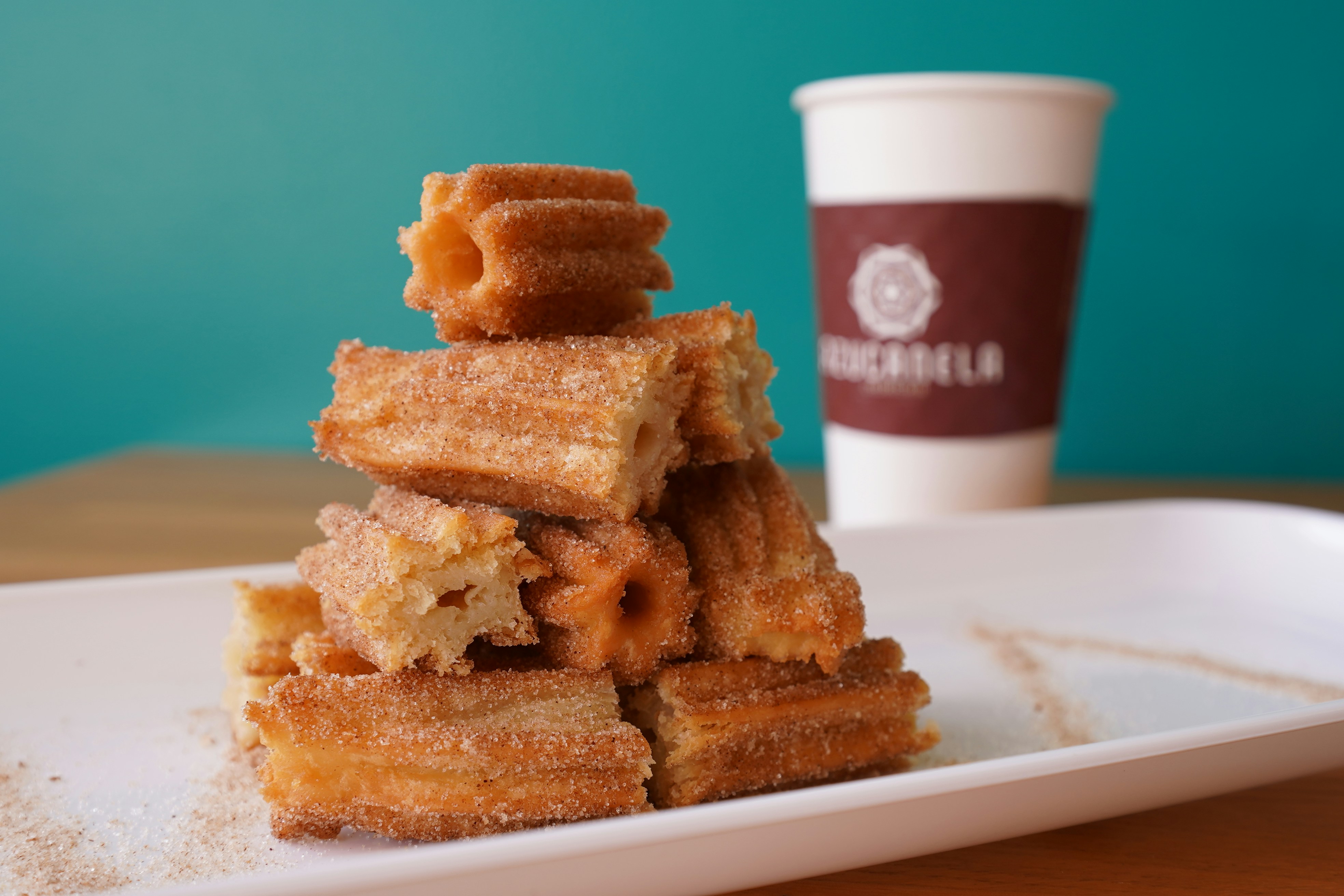 A stack of food sitting on top of a white plate