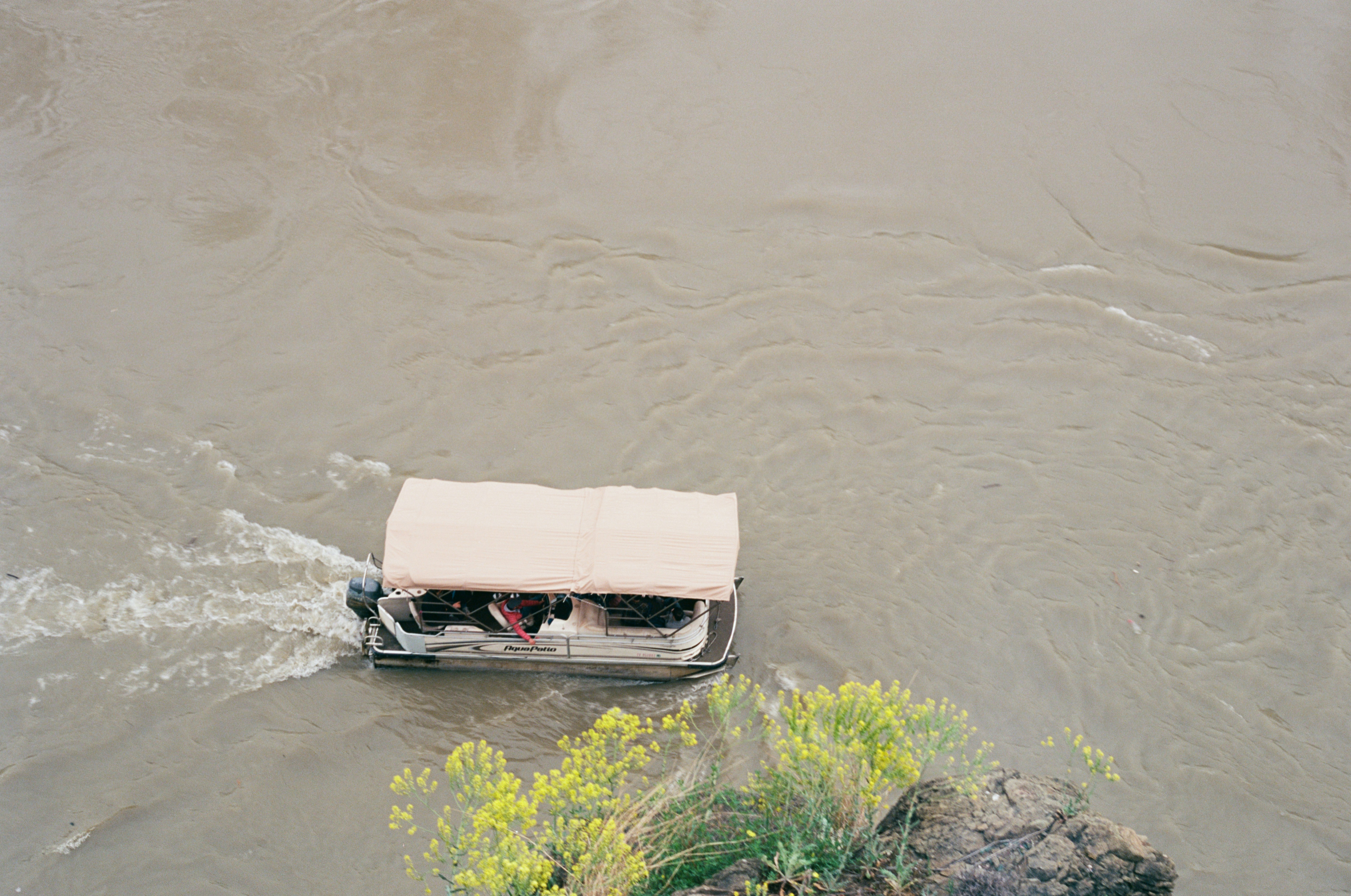 A small boat in a body of water