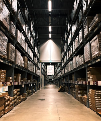 A warehouse filled with lots of shelves filled with boxes