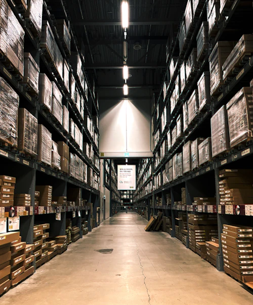 Warehouse shelves full of boxes ready for distribution