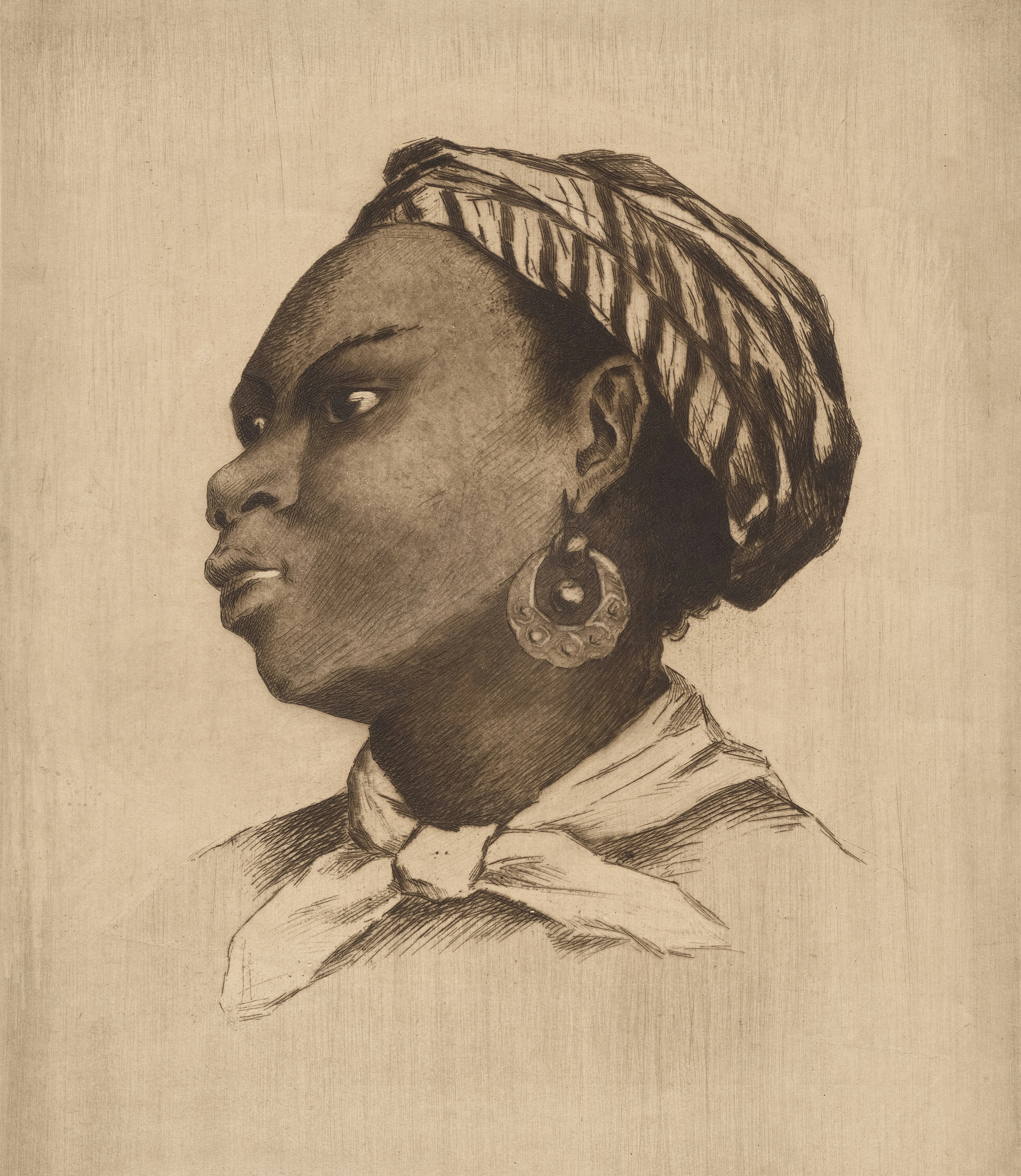 A woman with a headscarf and large earrings.