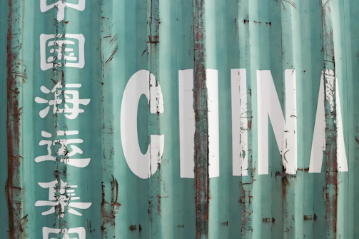 A close up of a metal container with writing on it