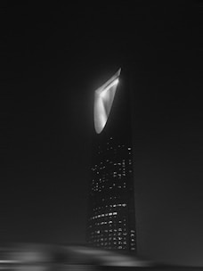 A black and white photo of a tall building