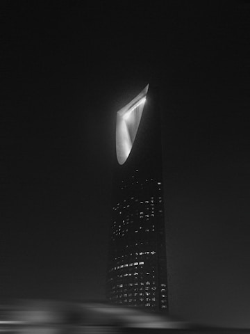A black and white photo of a tall building