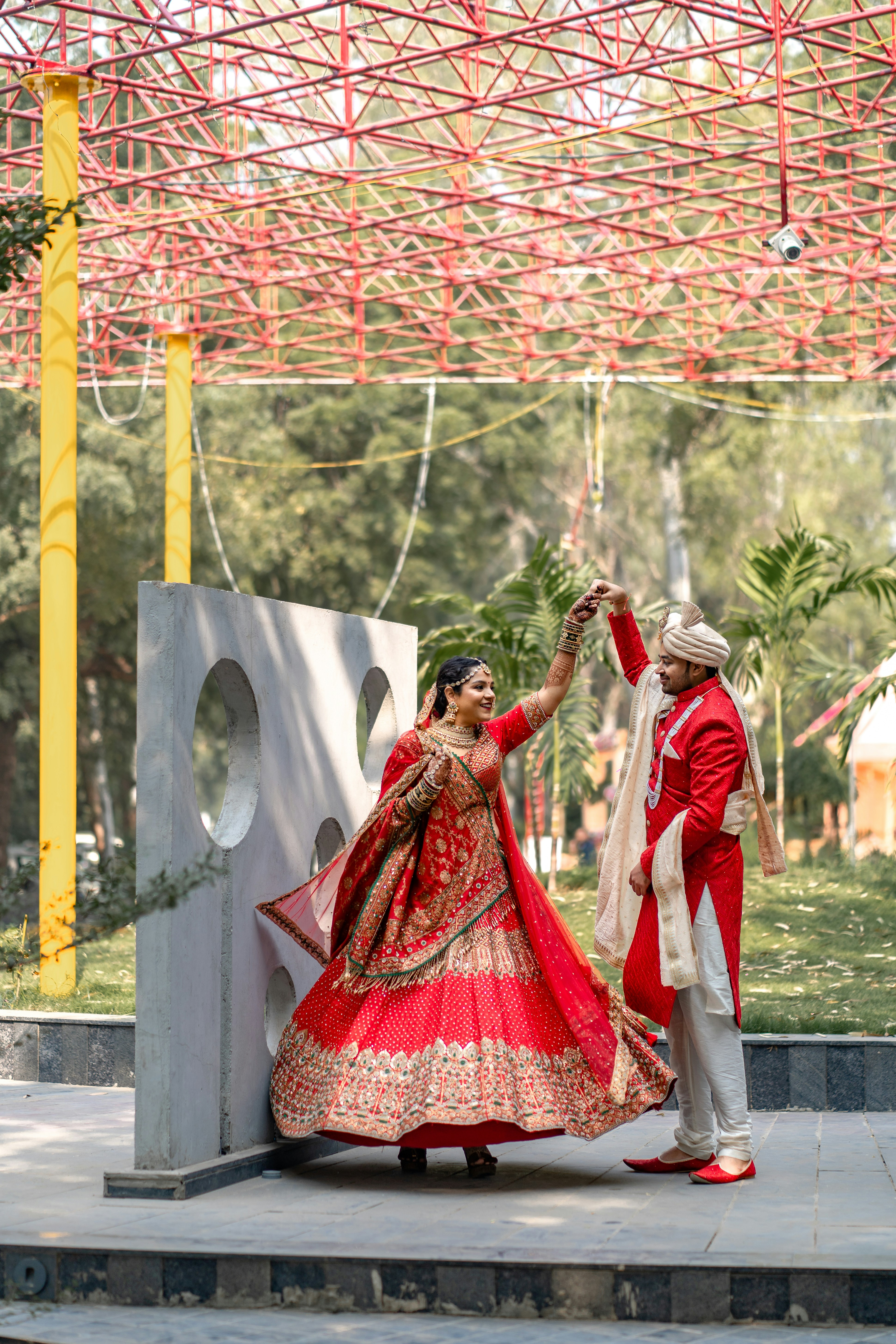 A man and a woman dressed in red and white
