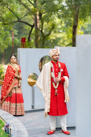 A man and woman dressed in indian attire