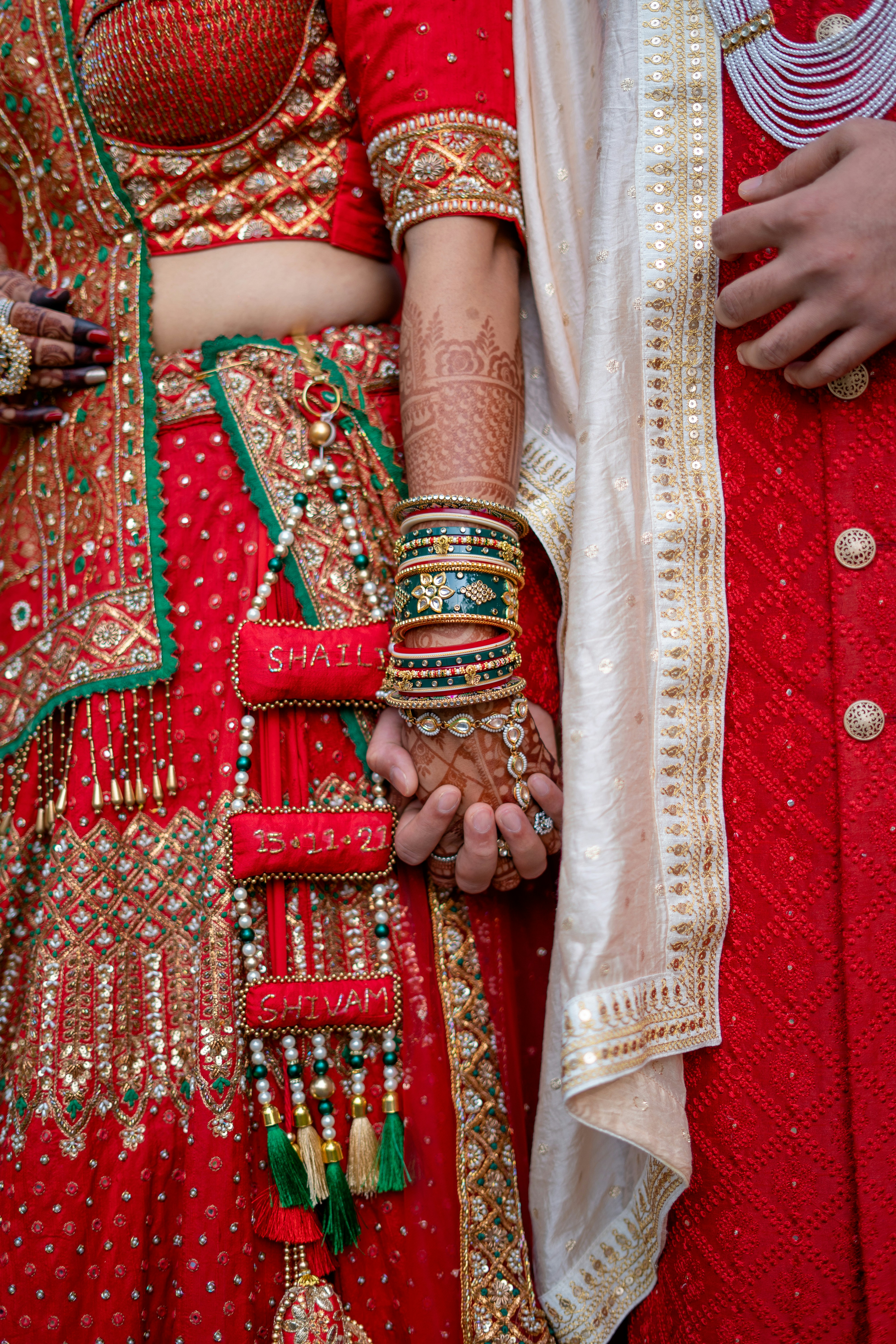A couple of people that are standing together