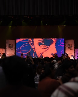 A crowd of people standing on top of a stage