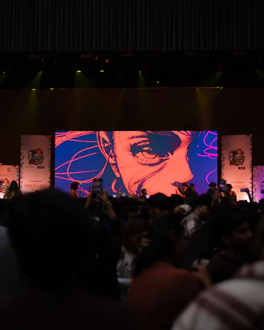 A crowd of people standing on top of a stage