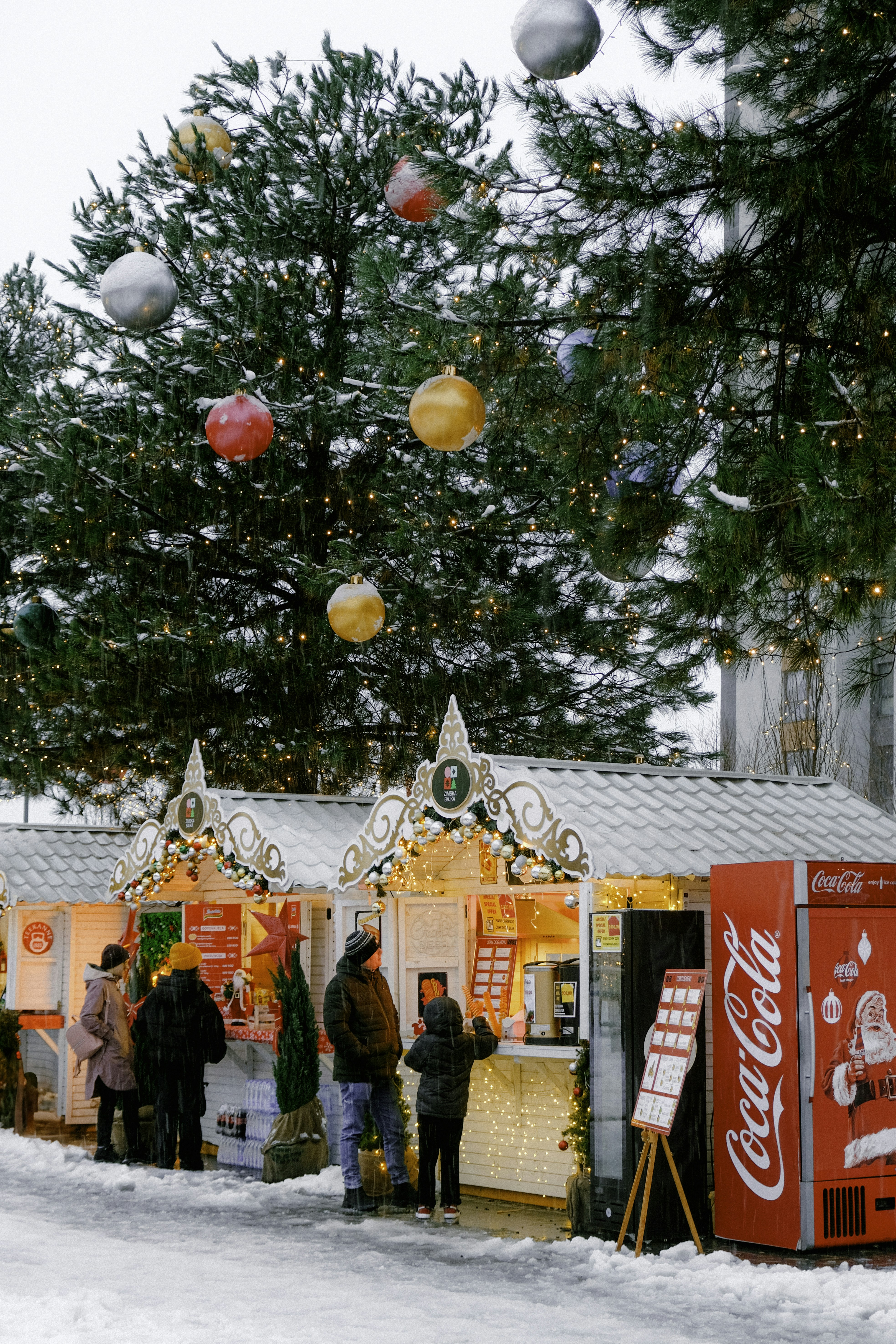 A group of people standing outside of a building