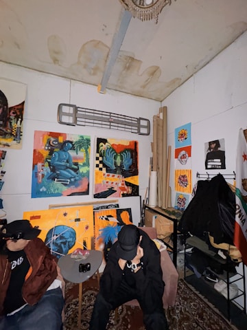 A couple of people sitting in a room