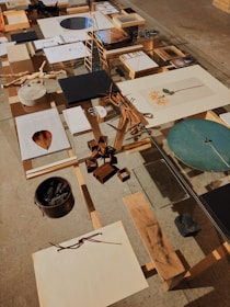 A table with many pieces of art on it