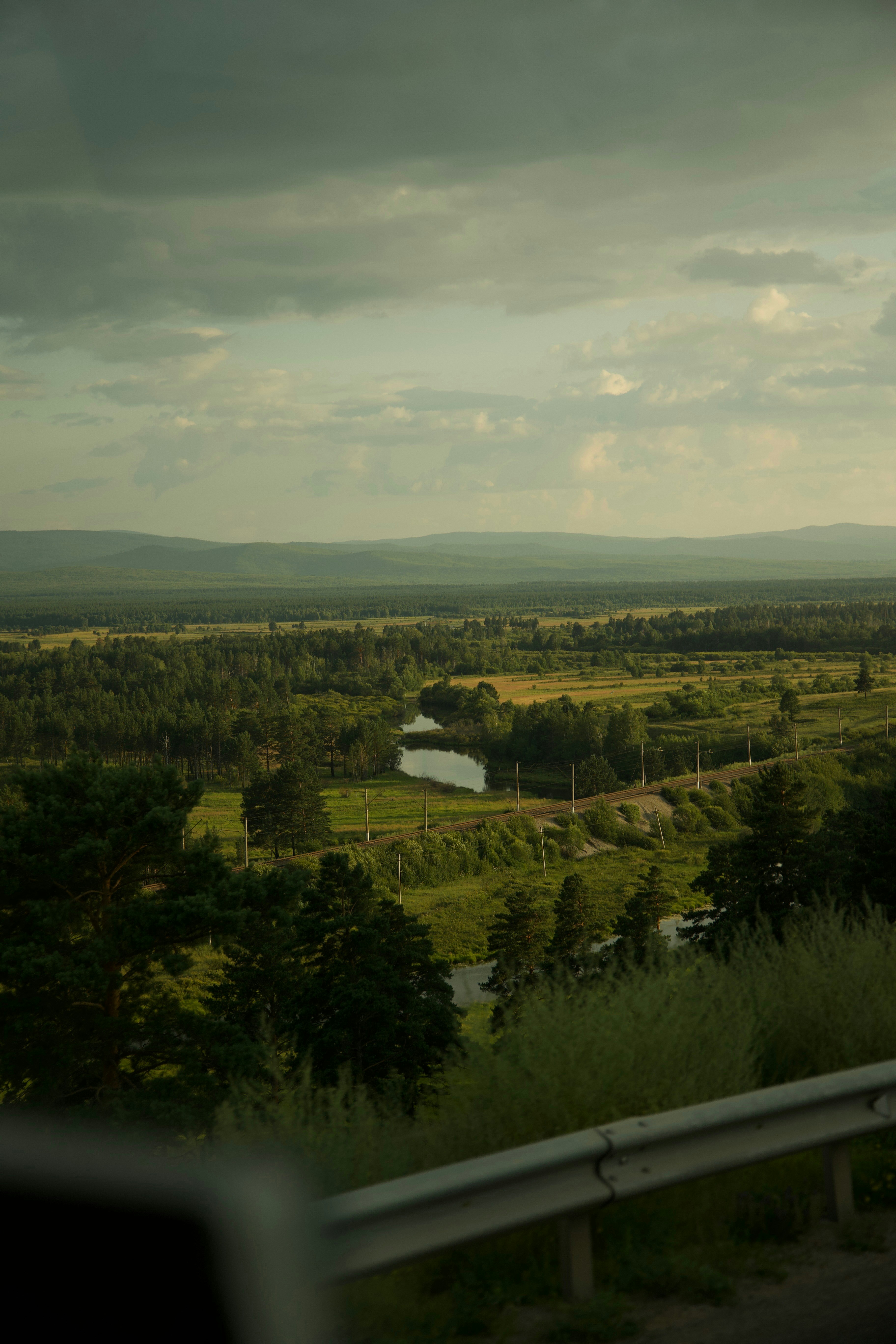 A scenic view of a valley and a river photo – Free Vegetation Image on ...
