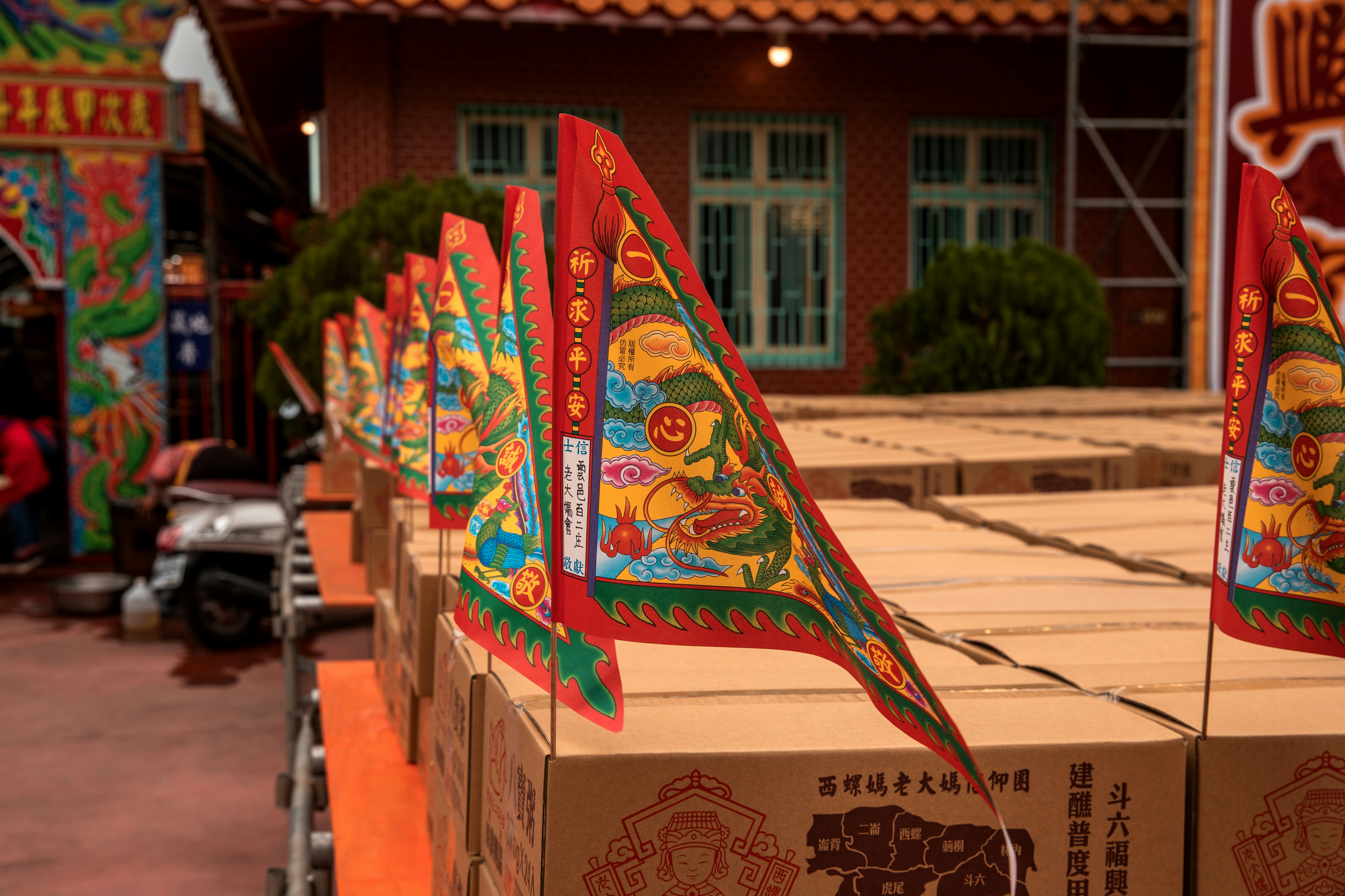 A bunch of boxes that are on a cart