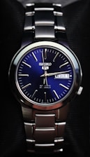 A close up of a watch in a box