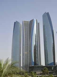 A couple of tall buildings sitting next to each other