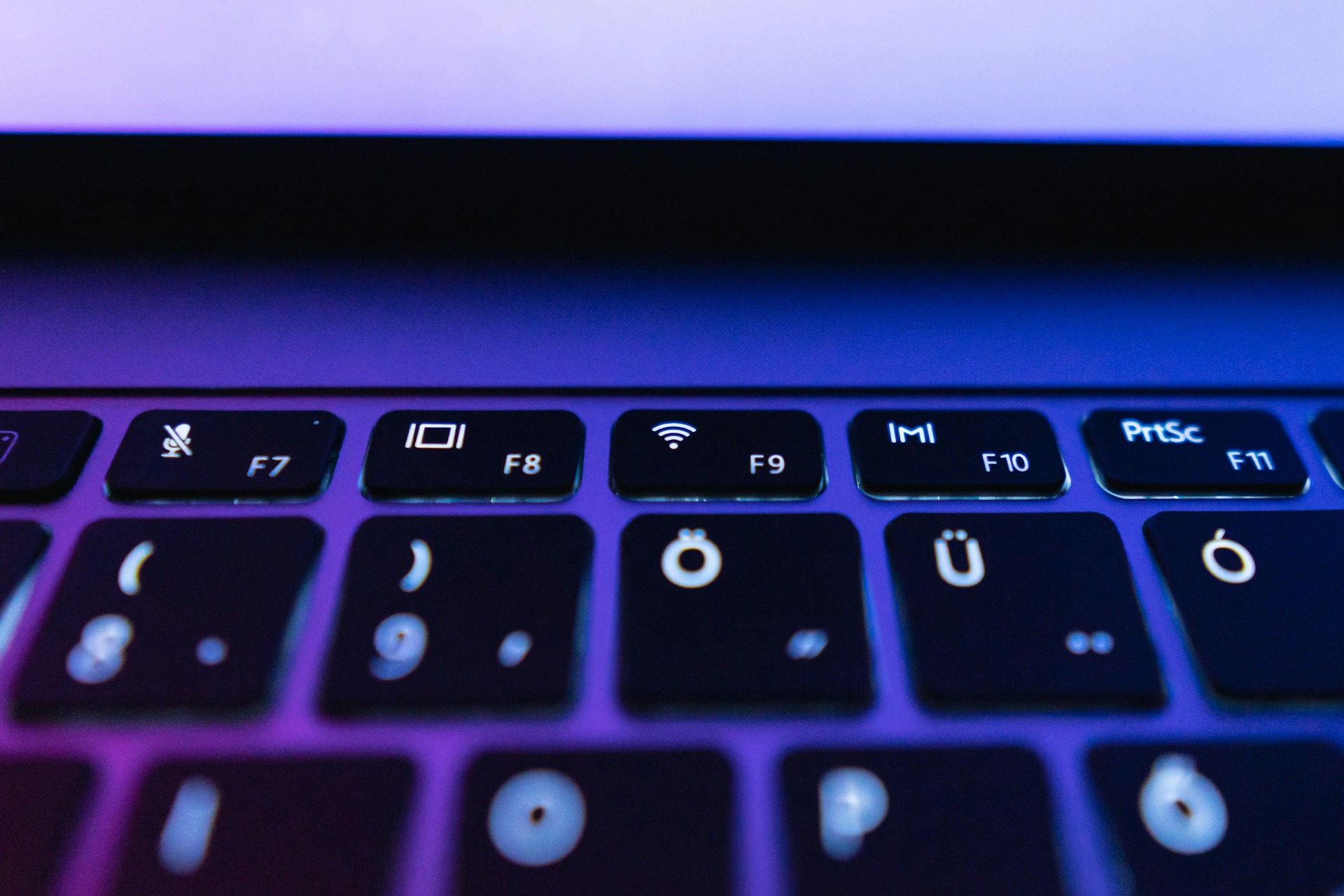 A close up view of a laptop keyboard
