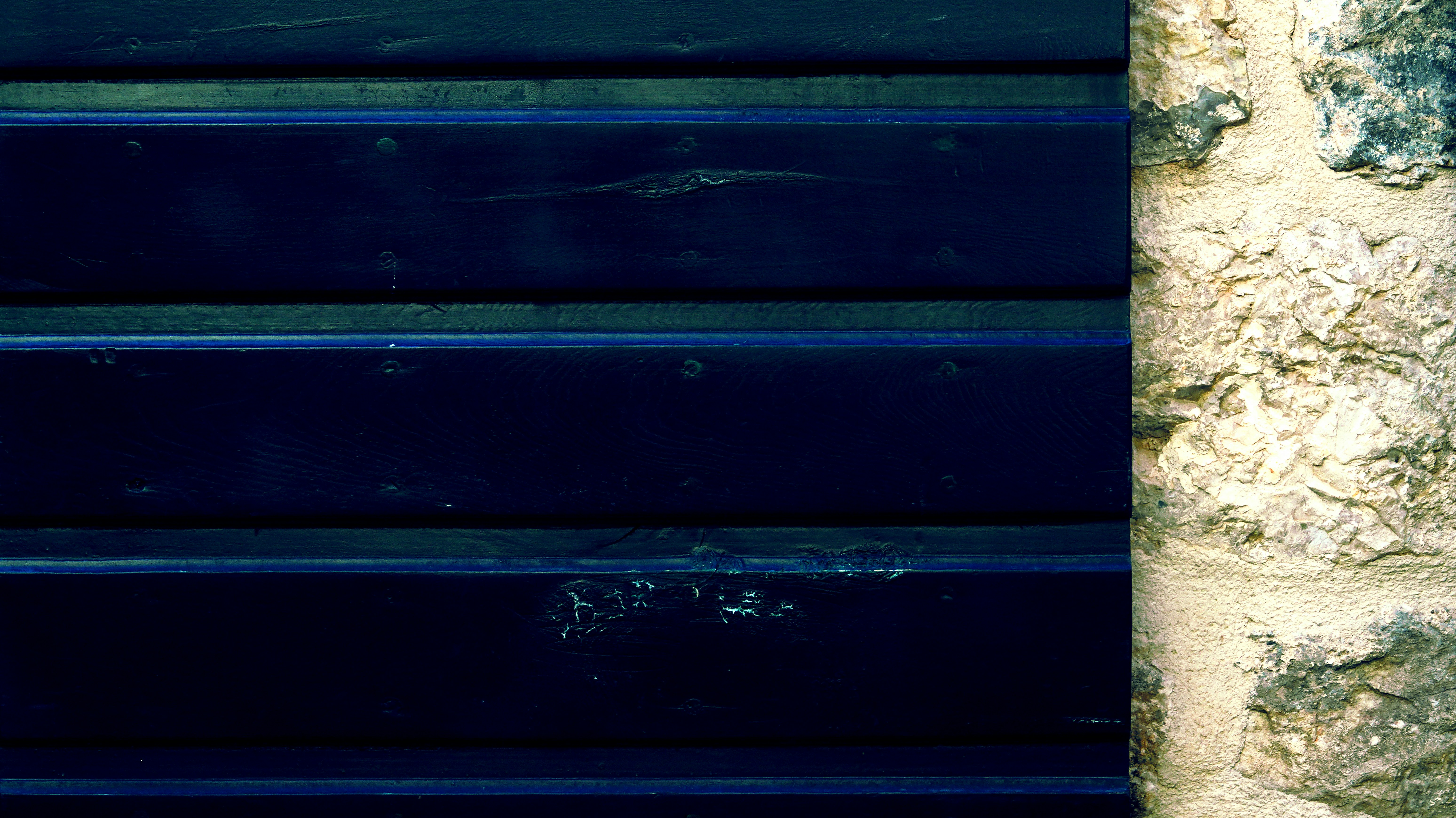 A close up of a street sign on a building