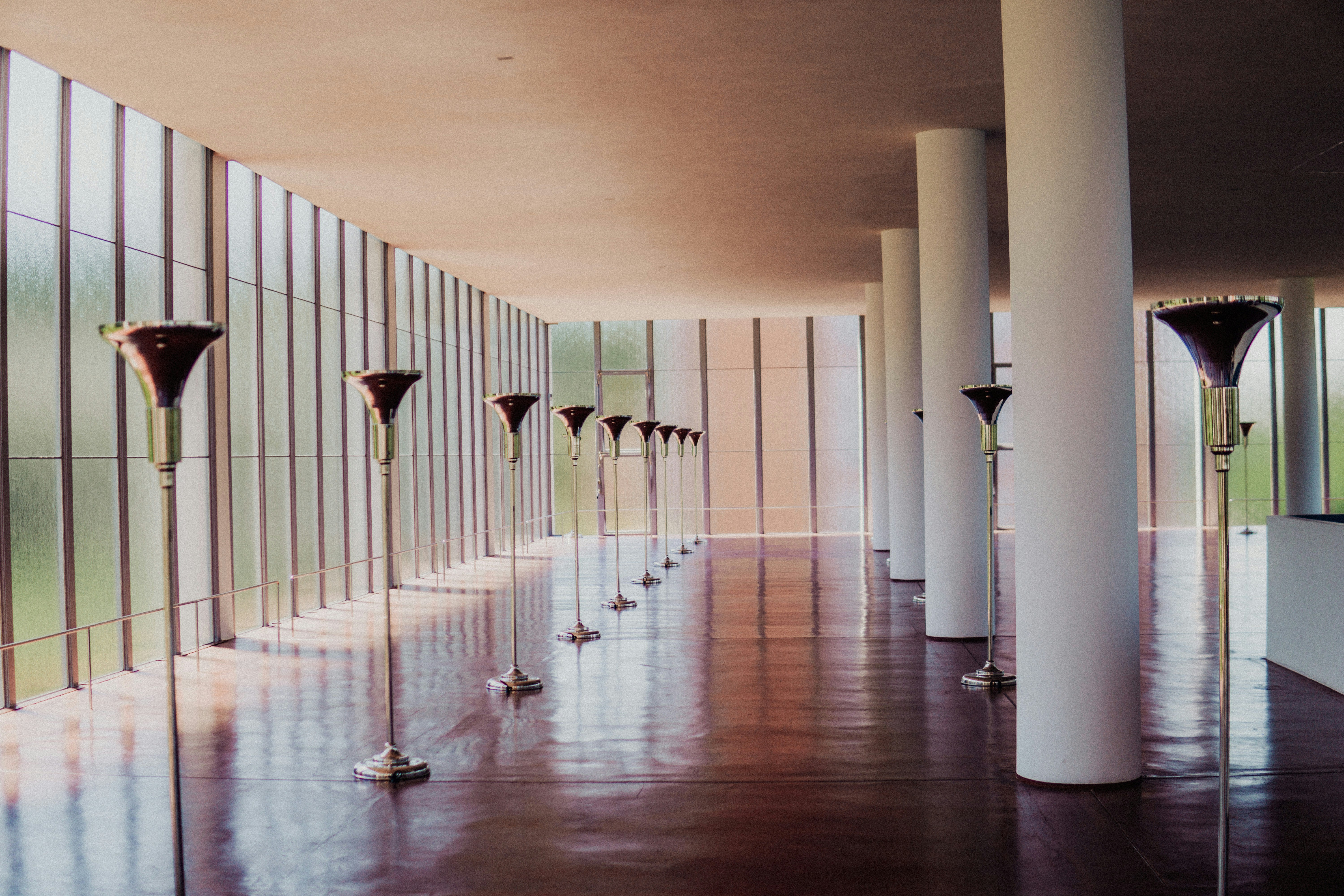 A long hallway lined with tall white columns