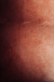 A man holding a tennis racquet on top of a tennis court