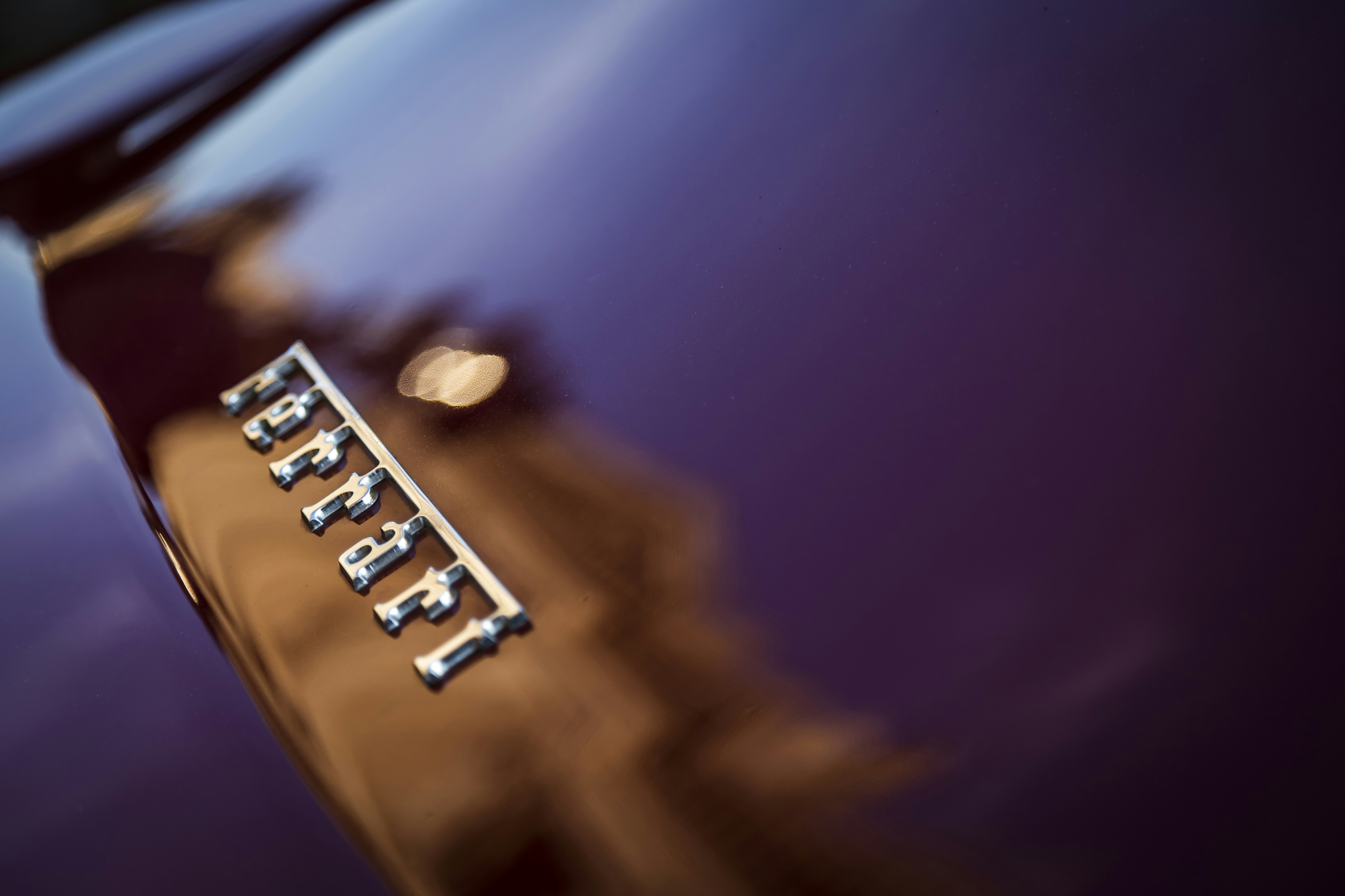 A close up of the hood of a car