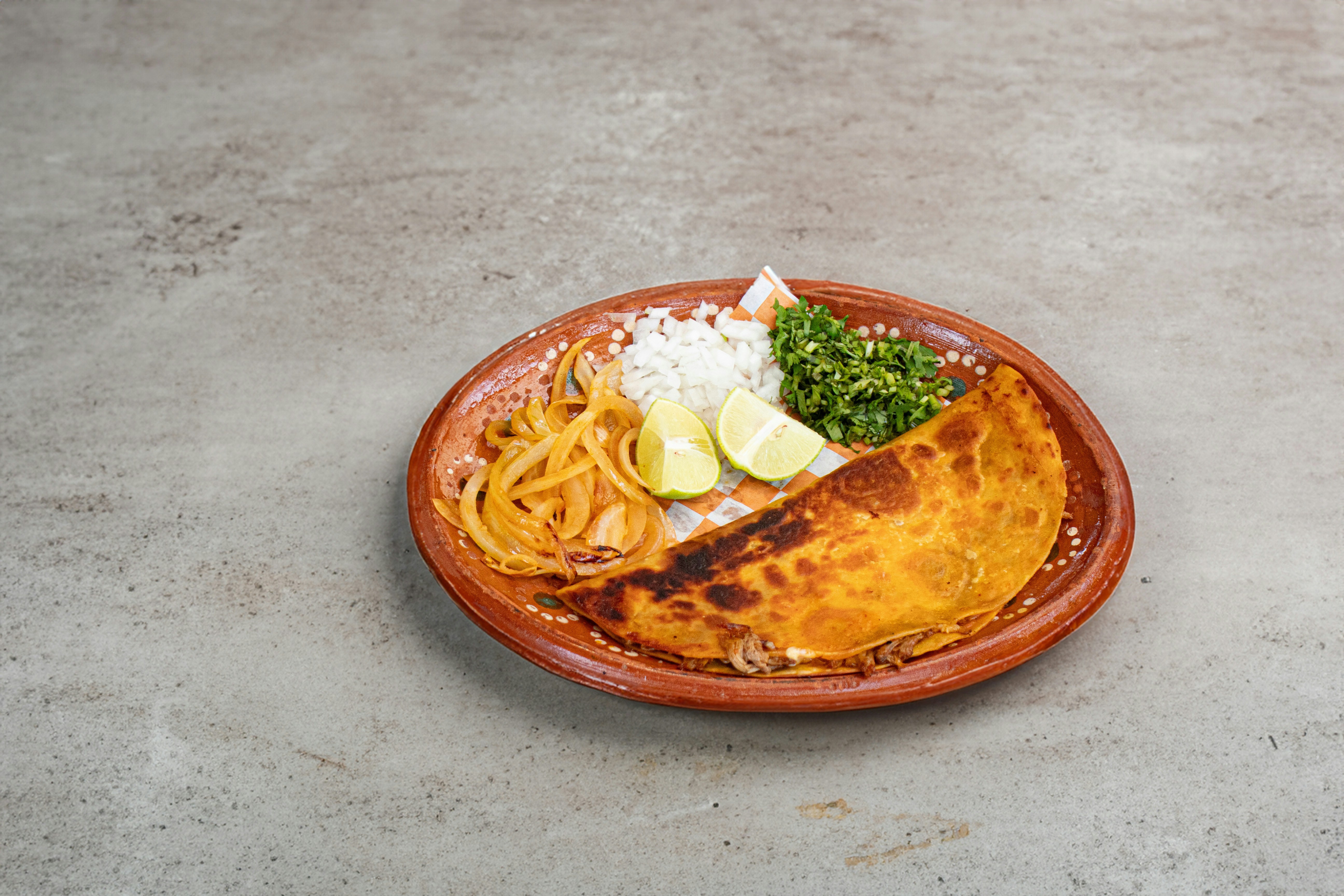 A plate of food that is on a table