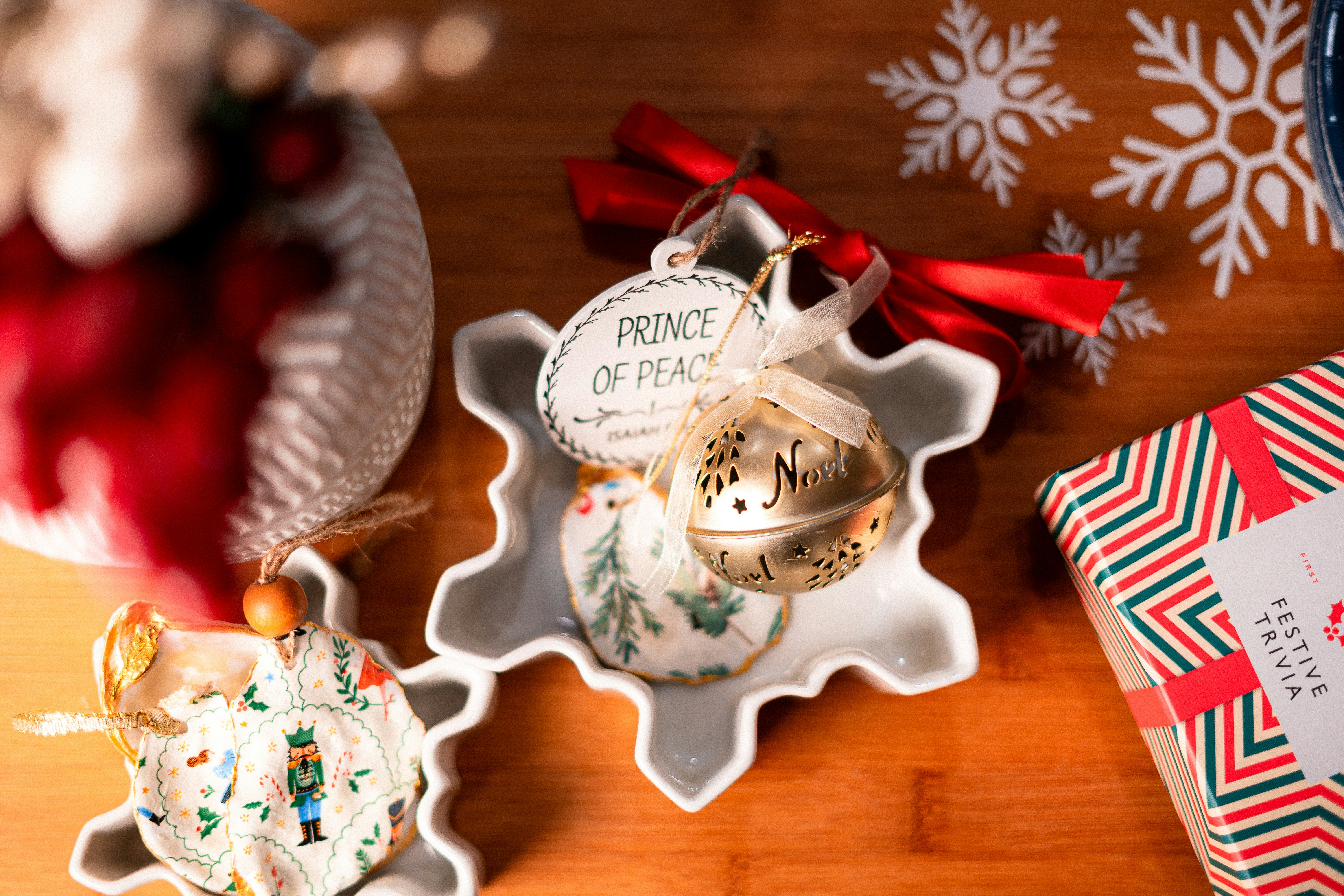 A couple of ornaments sitting on top of a wooden table