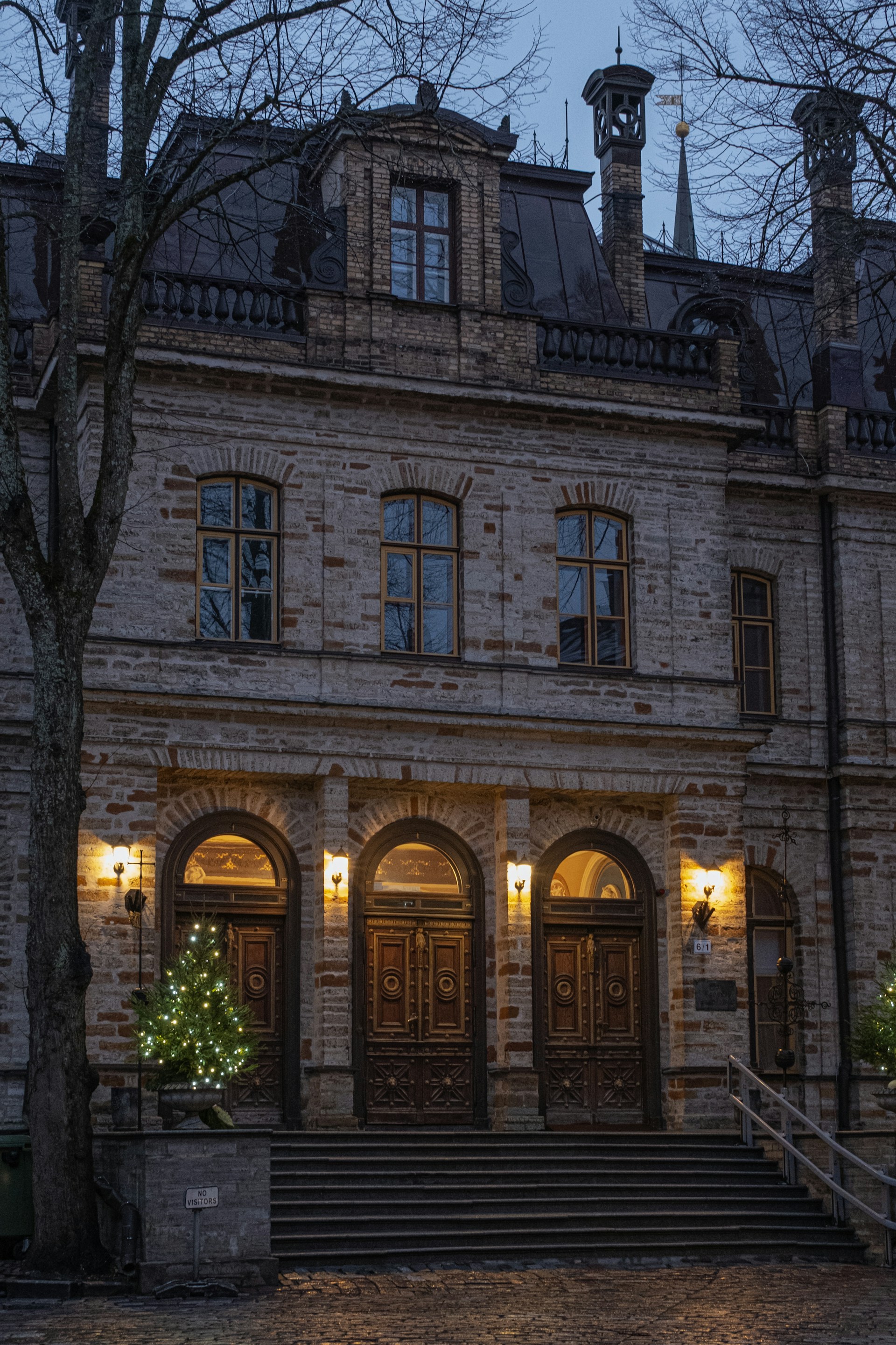 A large building with a lot of windows and lights