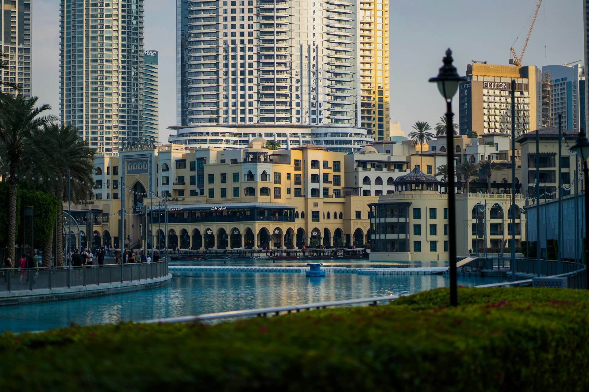 A view of a city with tall buildings in the background