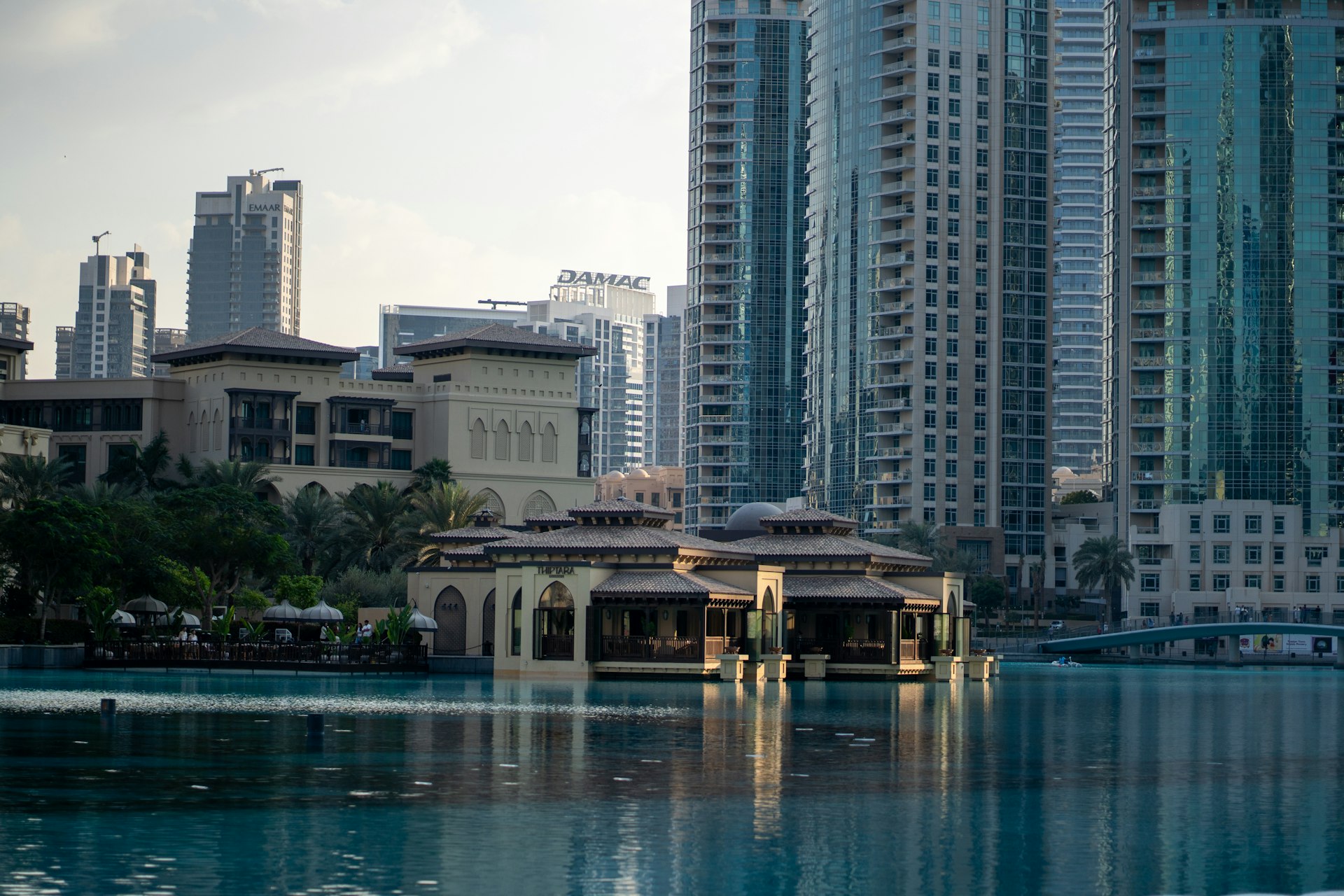 A large body of water surrounded by tall buildings
