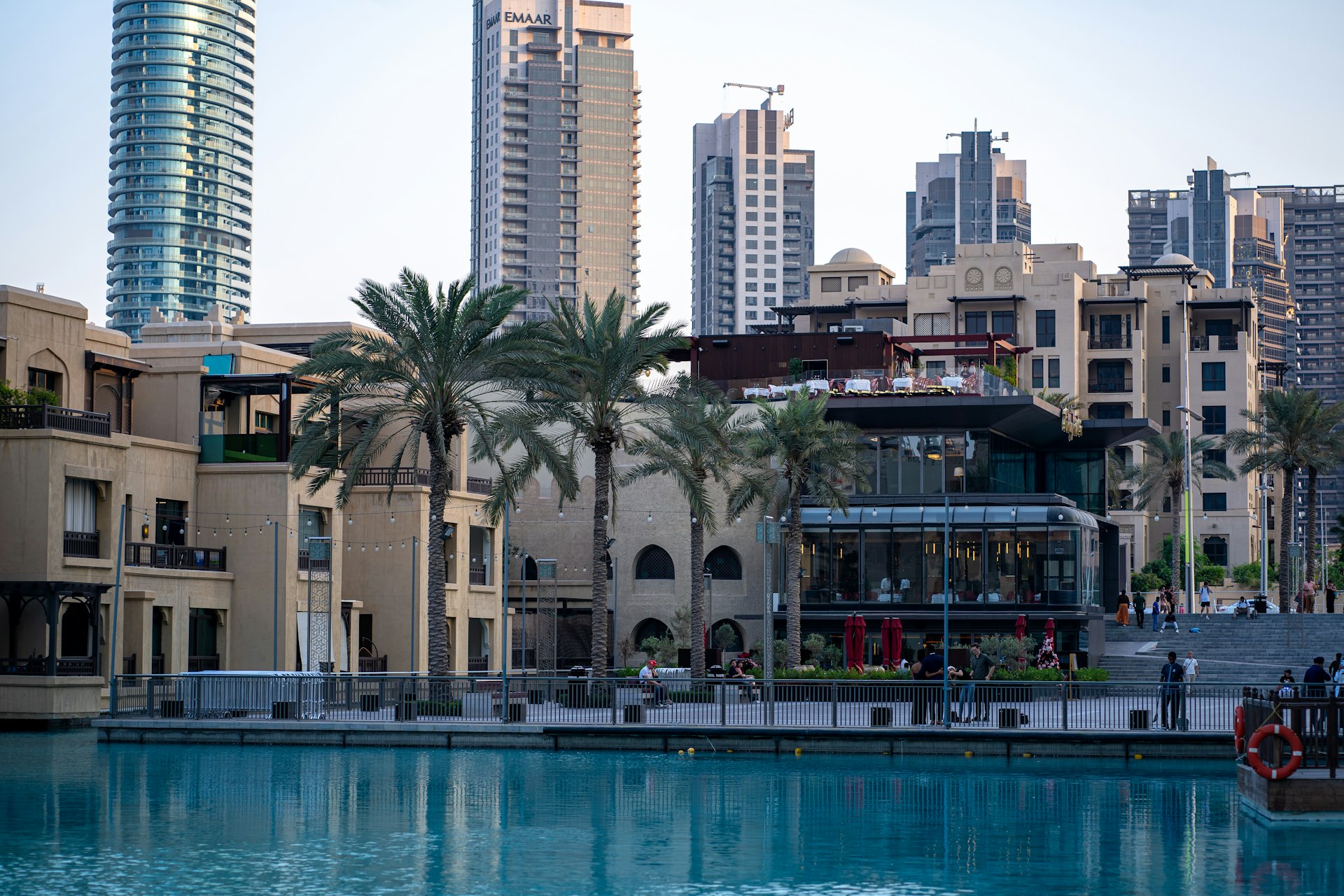 A large body of water surrounded by tall buildings