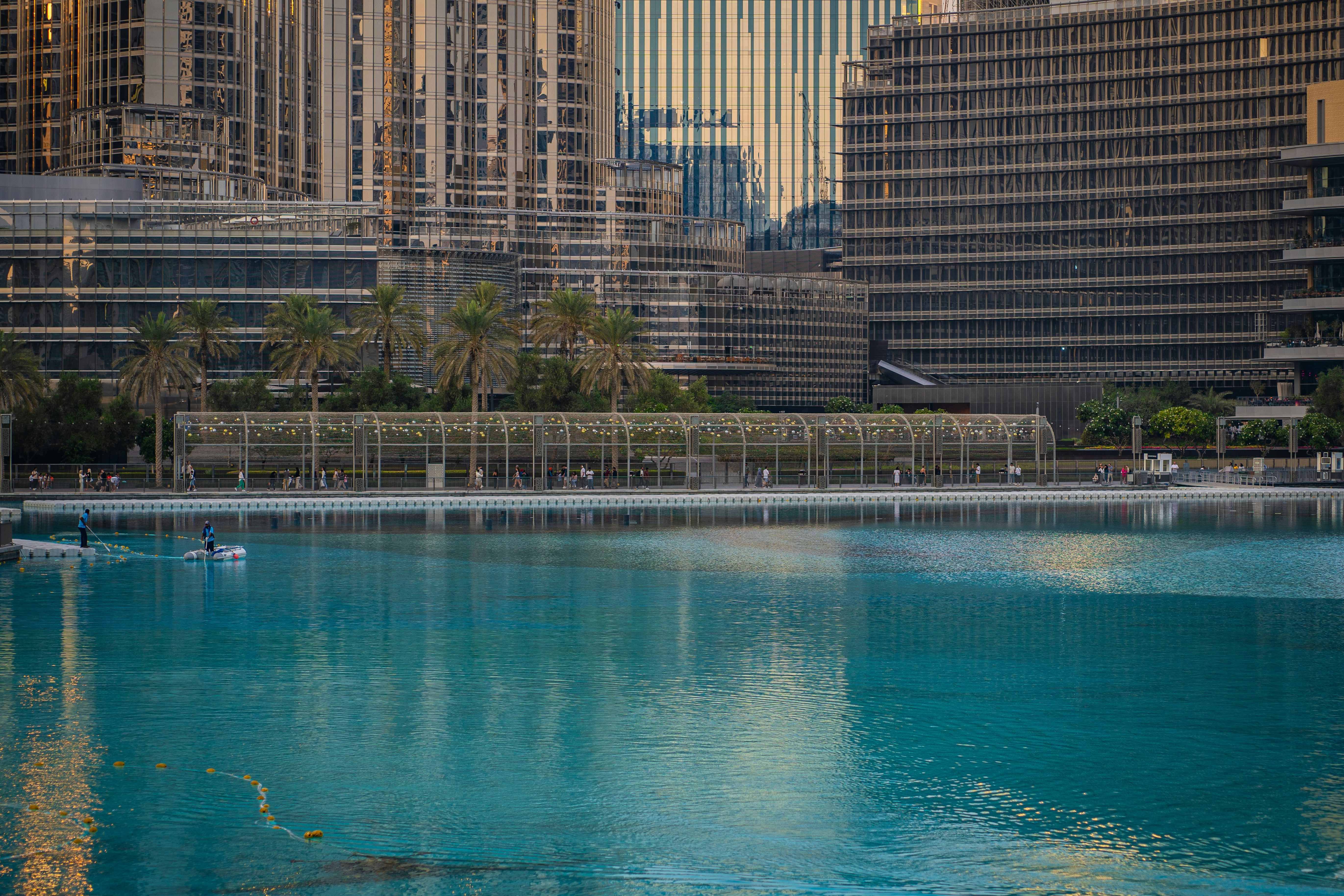 A large body of water surrounded by tall buildings