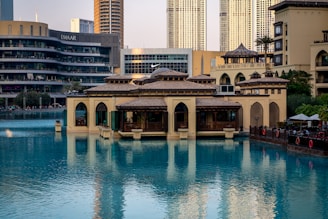 A large body of water surrounded by tall buildings