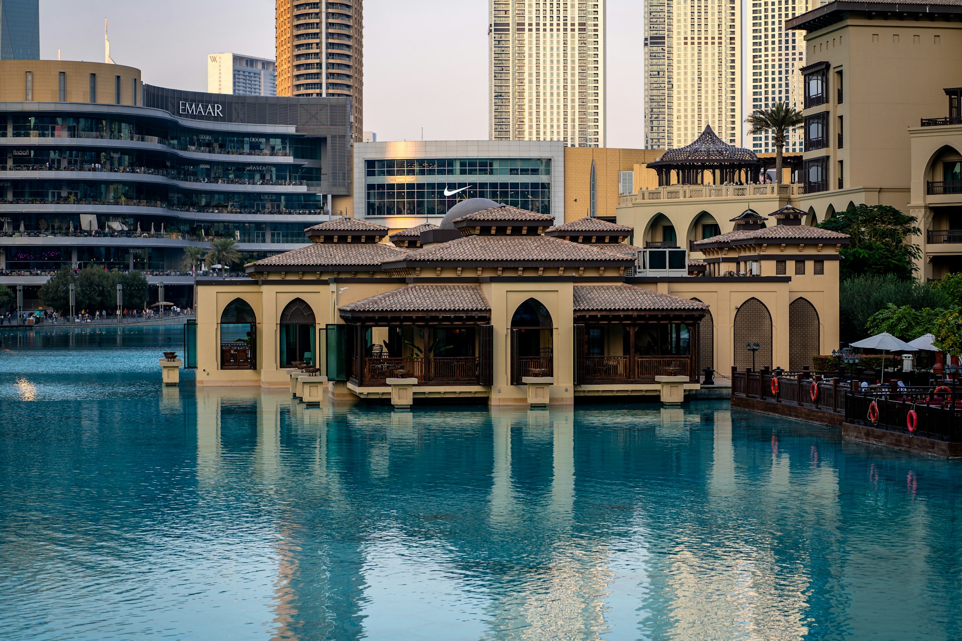 A large body of water surrounded by tall buildings