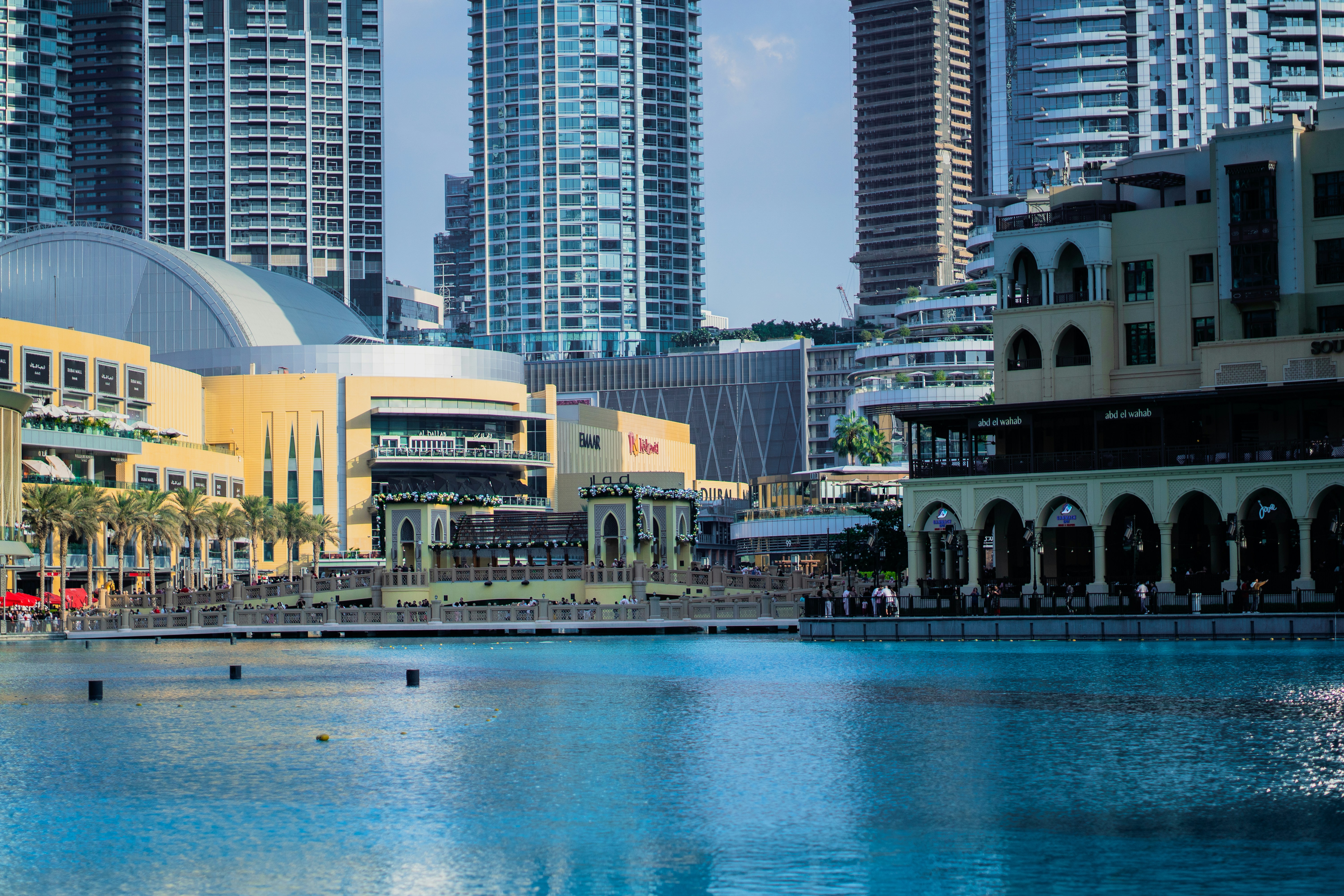A large body of water surrounded by tall buildings