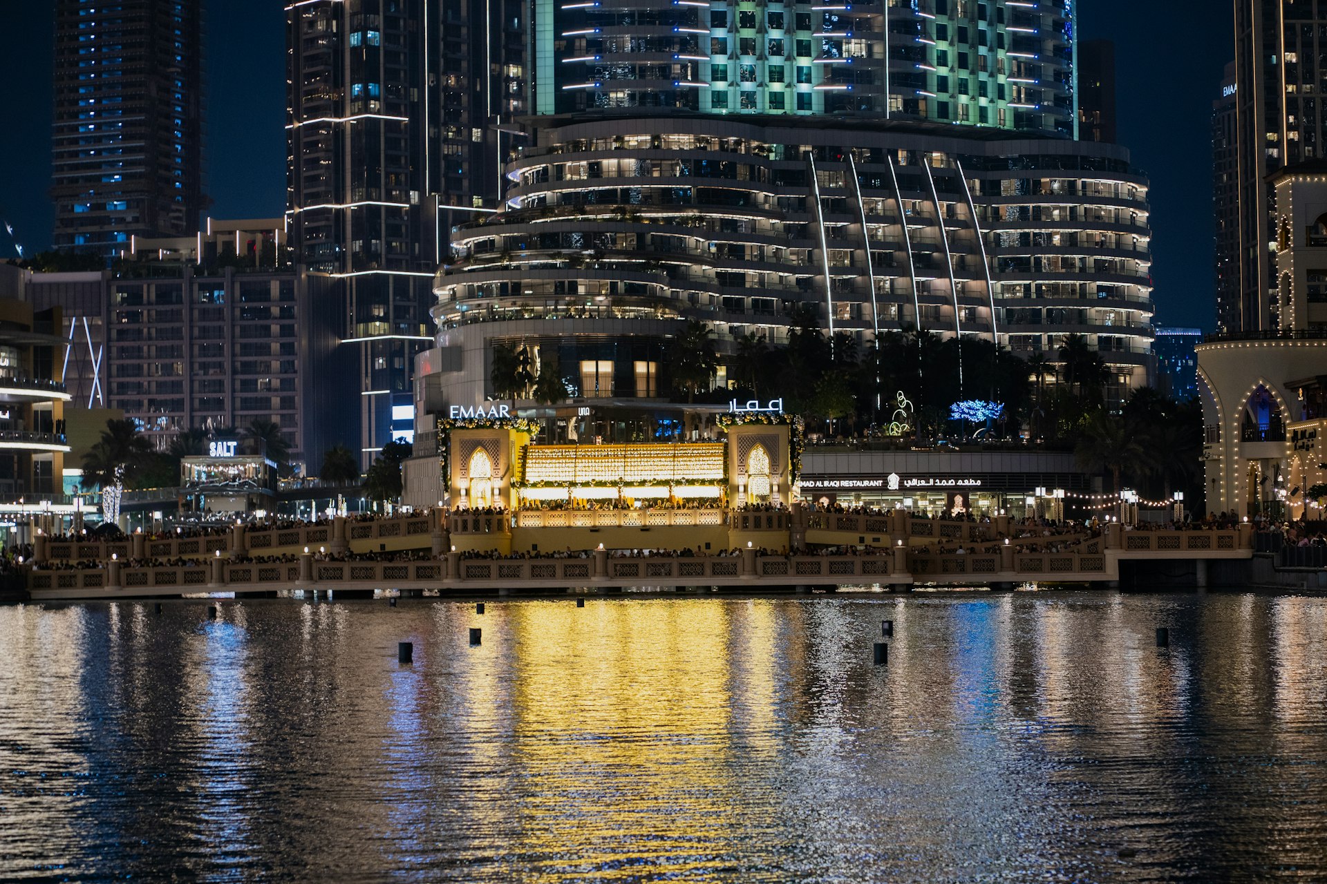 A large body of water with a city in the background