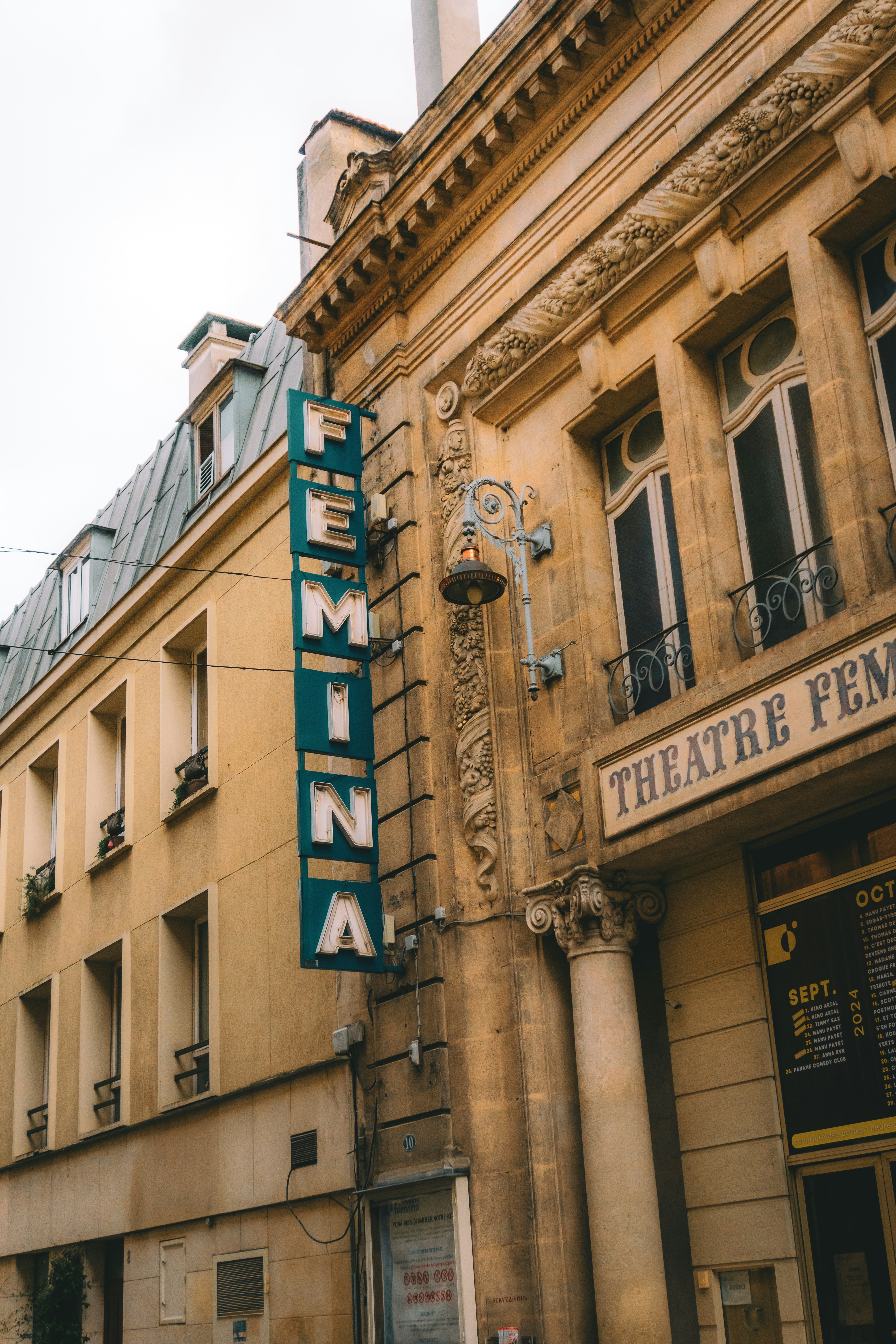 A large building with a sign on the side of it