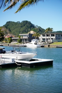 A couple of boats that are sitting in the water