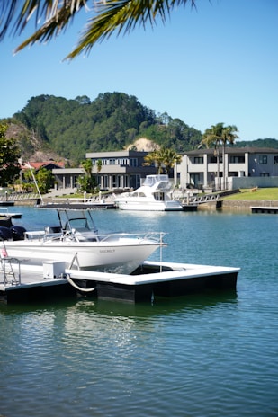 A couple of boats that are sitting in the water