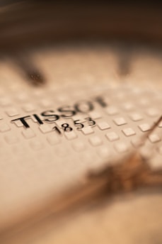 A close up of a watch face with the time displayed