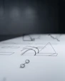 A close up of a piece of paper with a pen on it
