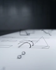 A close up of a piece of paper with a pen on it