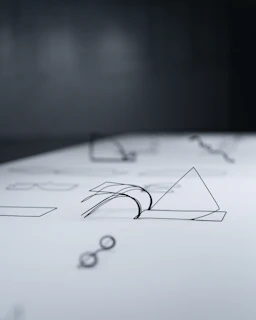 A close up of a piece of paper with a pen on it